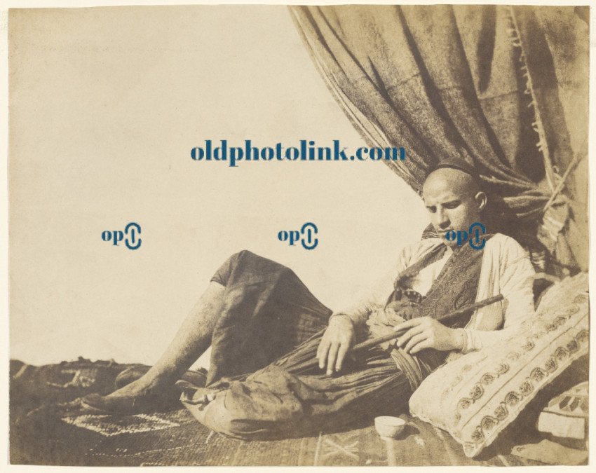 Reclining Algerian man with pipe 1855