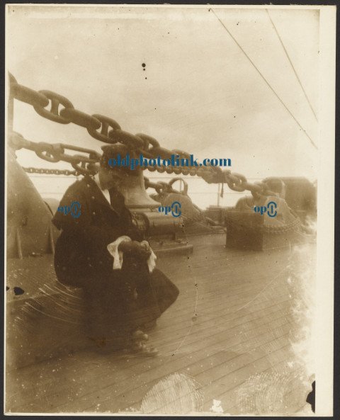 Unidentified Woman Sitting on the Deck of a Ship 1910
