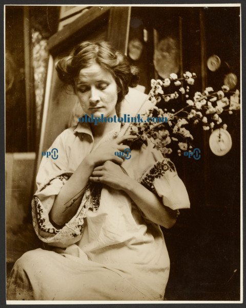 Female Model Holding Flowers 1900