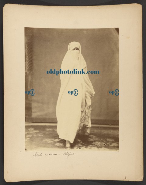 Woman wearing white robes 1870