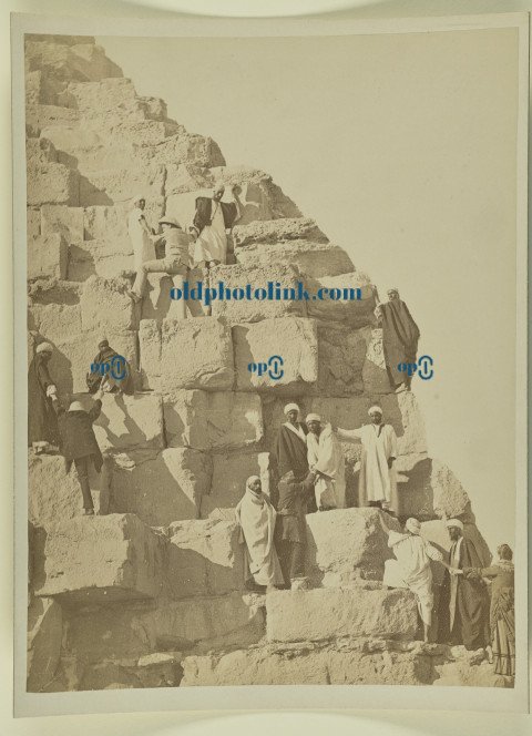 Men standing on steps of pyramid 1865